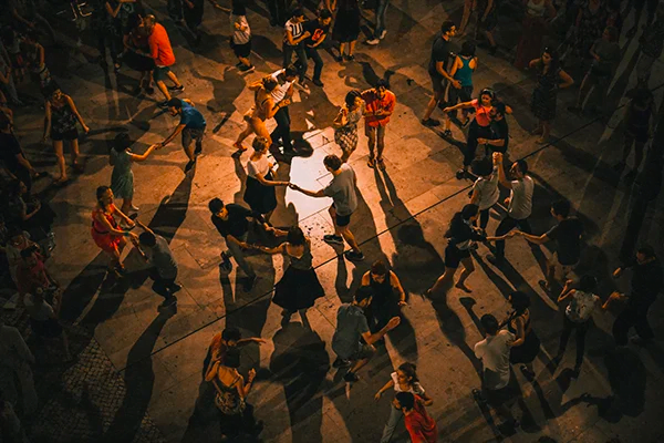 A group of people dancing
